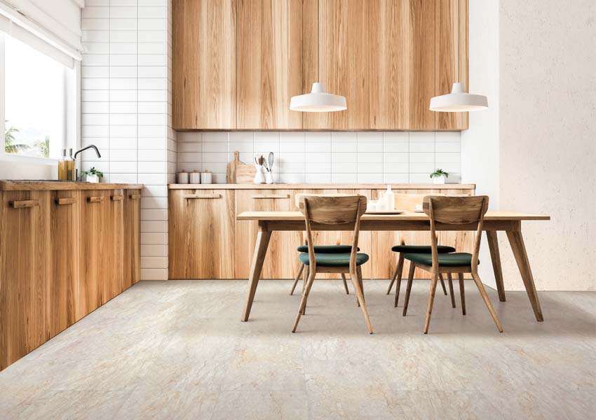 stone look vinyl flooring in kitchen with wood cabinets